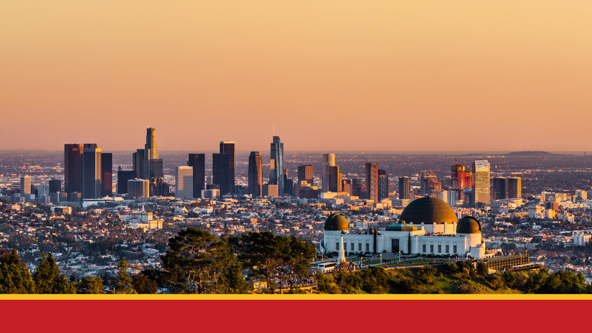 Aerial view of Los Angeles skyline featuring Griffith Observatory and downtown LA