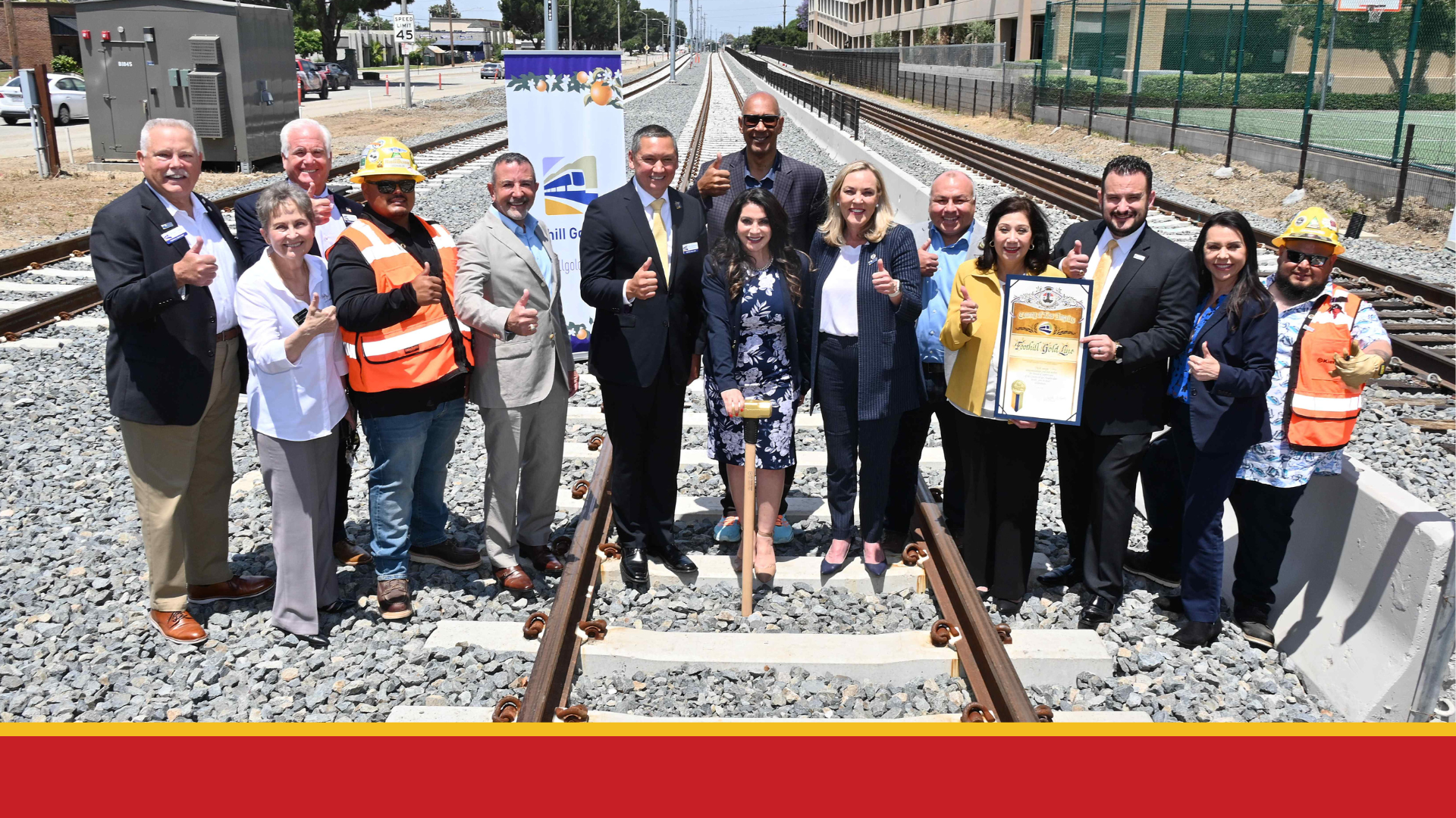Local leaders celebrating completion of major track construction