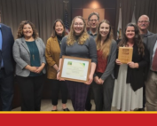 Goleta City Council and staff receiving the recognition award at the April 16 Council meeting. Pictured left-to-right: Councilmember James Kyriaco (District 2), Mayor Pro Tempore Luz Reyes-Martín (District 1), Mayor Paula Perotte, Sustainability Analyst Angeline Foshay, Councilmember Stuart Kasdin, Santa Barbara County Green Business Program Director Kori Nielsen, Sustainability Manager Dana Murray, Councilmember Kyle Richards, and Planning and Environmental Review Director Peter Imhof